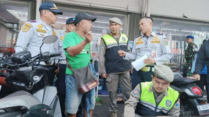 Jangan Main-main! Tukang Parkir Liar Kini Bisa Dijerat Penjara 9 Tahun, Ini Dasar Hukumnya